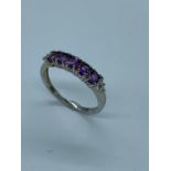 9 ct white gold and amethyst ring. Size R.