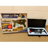 A boxed 7.63mm automatic U.N.C.L.E Lone Star toy gun and a boxed Laser Ray gun
