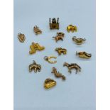 A selection of 9 ct gold charms (18.9 g)