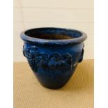 A blue glazed garden pot with grapes and vines to the side (44cm x 48cm)