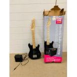 A Puretone kids electric guitar and amp set