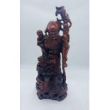 A wooden statue of Shulow God of Long Life