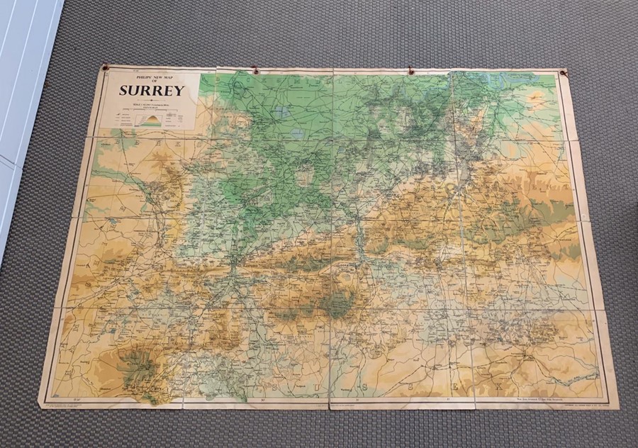 A folding Philips wall map of Surrey 1950's (175cm x 125cm)