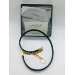 A Lalique belt in original box