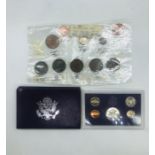 A small selection of coins and a 1987 United States Proof Set