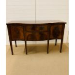 A serpentine fronted sideboard