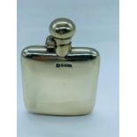 A silver hip flask, London hallmark, maker's mark JDWD.