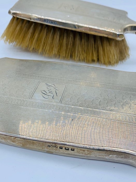 Silver dressing table brush and mirror, hallmarked Birmingham 1934 by DM Co. - Image 2 of 2