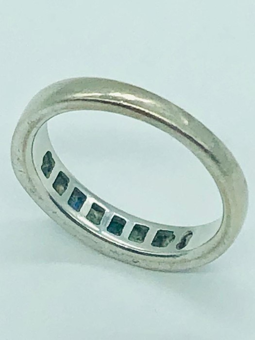 An 18 ct white gold half eternity ring with diamonds and sapphires. - Image 5 of 5