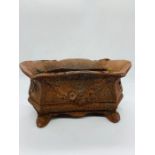 A small cast iron urn