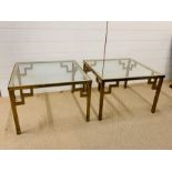 A pair of square brass and glass coffee tables with geometric design 62 cm square and 41 cm high.