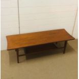 A Mid Century teak coffee table with lower shelf by Fyne Ladye of Banbury