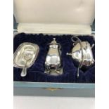 A boxed Japanese silver cruet set