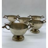 A selection of five South American silver two handled bowls.