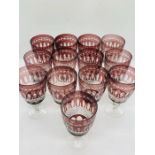 Thirteen Cranberry glass wine goblets