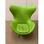 A lime green egg chair