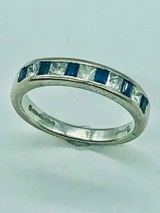 An 18 ct white gold half eternity ring with diamonds and sapphires. - Image 3 of 5
