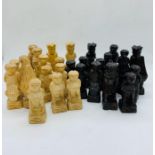 A wooden carved chess set