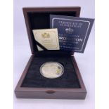 A silver proof £5 coin, 65th Anniversary of the Coronation, boxed with paperwork.