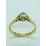 A single diamond ring set in 18 ct yellow gold.