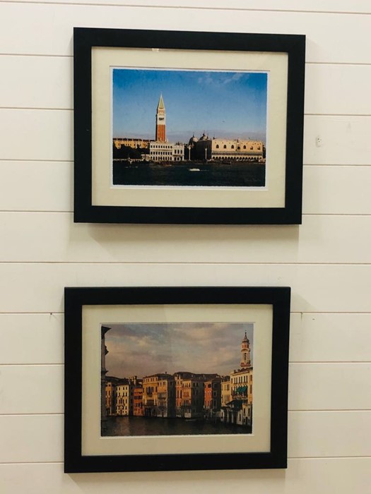 A pair of large framed photo prints by Chris Towler
