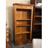 A tall pine bookcase with five shelves (H197cm D35cm W100cm)