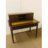 A desk with desk top drawers, leather inlay and two drawers under on turned bobbin legs (AF)