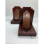 A pair of art deco wooden book ends