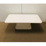 A marble coffee table with pedestal base circa 1980's (W125cm D68cm H46cm)