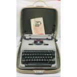 A cased SM4 Olympia typewriter