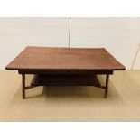 A rectangular wicker coffee table