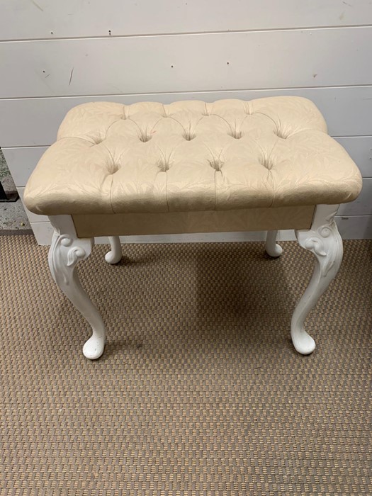 A vanity stool with cream button seat pad and cabriole legs (56cm x 48cm)