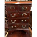 A small mahogany unit with 5 drawers