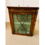 A mahogany small glazed wall hanging corner unit (55cm x38cm)