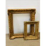 Two wooden gilt picture frames measuring 45cm x 34cm and 73cm x 60cm