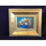 An oil on canvas of flowers in a blue pot in a gilt frame signed bottom right Je Fuz (27cm x 31cm)