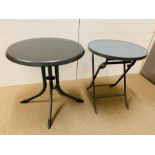 Two grey circular tables