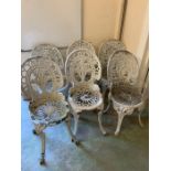 Six wrought iron white painted garden chairs