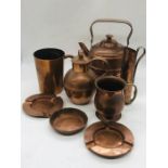 A selection of eight smaller copper items to include a beaker stamped KWACHA copperware KITWE,