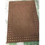 A modern patterned taupe rug (160cm x 230cm)