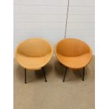 A mid century modern hoop chairs