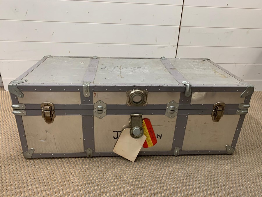 A metal travel trunk (90cm x 34cm)