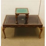 Two drinks tables with embossed leather under glass top with decorated cabriole legs and raised