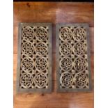 A pair of gold painted carved wooden wall panels (50cm x 25cm)