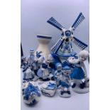 A selection of Delft ware to include windmills, clogs and jugs