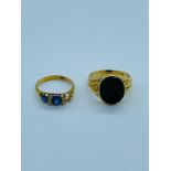 Two 18 ct gold rings (Total Weight 9.4g)