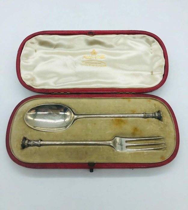 A cased silver hallmarked London Mappin and Webb fork and spoon set