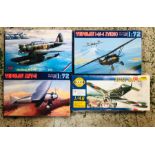 Four boxed aircraft kits, one completely sealed