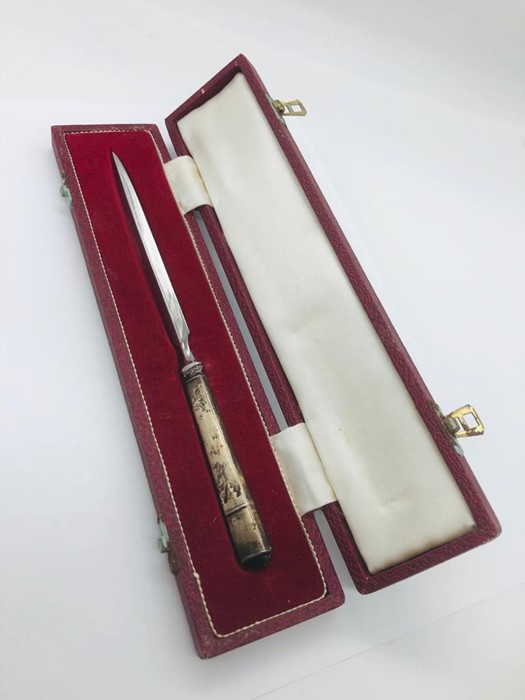 A Cased silver, hallmarked letter opener. - Image 5 of 8