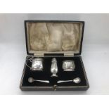 A silver cruet set, makers mark R & D, hallmarked Birmingham.